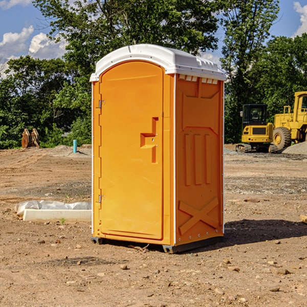 how often are the portable restrooms cleaned and serviced during a rental period in Harwood